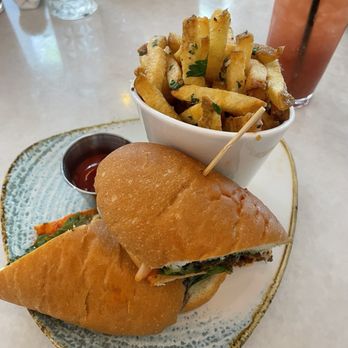 Paradiso - Eggplant Parmesan sandwich with the rosemary fries - Bars Near Me - Dallas, Texas