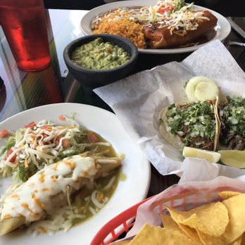 El Huarache Azteca - Tamale and tacos with large chimichanga in back. Fresh guac - Mexican Near Me - Clearwater, Florida El Huarache Azteca - Tamale and tacos with large chimichanga in back. Fresh guac - Mexican Near Me - Clearwater, Florida