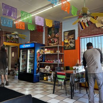 Taqueria Mi Raza - people walking through a mexican restaurant - Tacos Near Me - Sacramento, California Taqueria Mi Raza - people walking through a mexican restaurant - Tacos Near Me - Sacramento, California