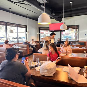 Sunny Side Cafe - One of the dining rooms that has a few tables behind me in this photo that can handle a large group. - Breakfast & Brunch Near Me - Seal Beach, California Sunny Side Cafe - One of the dining rooms that has a few tables behind me in this photo that can handle a large group. - Breakfast & Brunch Near Me - Seal Beach, California