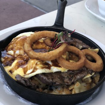Hash Kitchen - The Hangover Filet Hash! The portion was good but cold! Cheese wasn't melted and the onion rings were old and stale! - Breakfast & Brunch Near Me - Scottsdale, Arizona