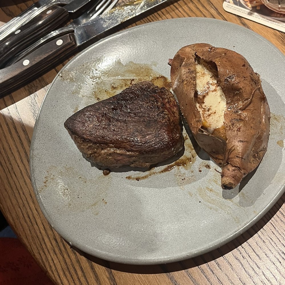 Outback Steakhouse - Center-Cut Sirloin* (6 oz) with a loaded sweet potato - Steakhouses Near Me - Miami, Florida Outback Steakhouse - Center-Cut Sirloin* (6 oz) with a loaded sweet potato - Steakhouses Near Me - Miami, Florida