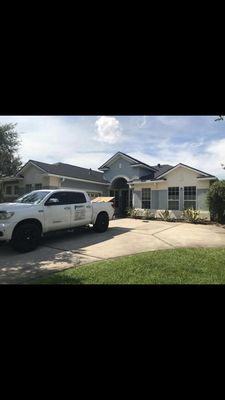 Priority 1 Roofing and Construction Logo