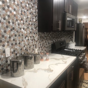 Dave's Depot - Beautiful bronze, copper, silver, brass hexagon shaped backsplash with grey grout. All from Dave's Depot - Cabinetry Near Me - Los Angeles, California Dave's Depot - Beautiful bronze, copper, silver, brass hexagon shaped backsplash with grey grout. All from Dave's Depot - Cabinetry Near Me - Los Angeles, California