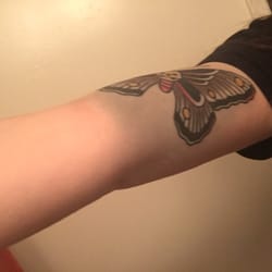 Resurrection Tattoo - I had gotten tattoo from Ben Haynes and now left with very noticeably large ink blowout due to the artist tattooing to deeply.