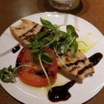 Bazille at Nordstrom - Grilled farm bread bruschetta. - New American Near Me - Tampa, Florida Bazille at Nordstrom - Grilled farm bread bruschetta. - New American Near Me - Tampa, Florida