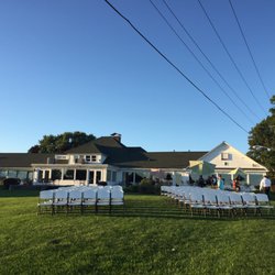 Geneva Country Club - Outdoor wedding facing lake. Windows flooded the main room with sunlight and a large patio spanned the entire building.