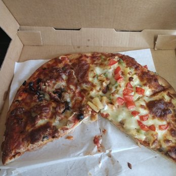 Union Square Deli - This is in full light. The left half of the pizza is overcooked. You cannot tell what toppings are on it. - Pizza Near Me - Union, Washington Union Square Deli - This is in full light. The left half of the pizza is overcooked. You cannot tell what toppings are on it. - Pizza Near Me - Union, Washington