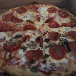 Medium pizza with pepperoni and half mushroom. All the ingredients were quality, crust was crisp and chewy, and it was garlic heaven.
