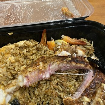 Pappadeaux Seafood Kitchen - Don't go here. This is a curbside order. Raw undercooked fish. - Seafood Near Me - Houston, Texas