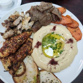 King O Falafel - Orlando - Combination platter spicy chicken gyro meat and chicken breast. - Mediterranean Near Me - Orlando, Florida King O Falafel - Orlando - Combination platter spicy chicken gyro meat and chicken breast. - Mediterranean Near Me - Orlando, Florida