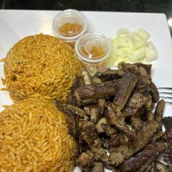 Dimmples Kettles - Suya and jollof rice