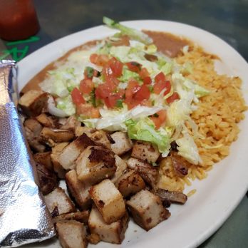 Arturo's Mexican Restaurant - Carnitas served rice & beans topped w/ lettuce & diced tomatoes. - Mexican Near Me - New Bern, North Carolina Arturo's Mexican Restaurant - Carnitas served rice & beans topped w/ lettuce & diced tomatoes. - Mexican Near Me - New Bern, North Carolina