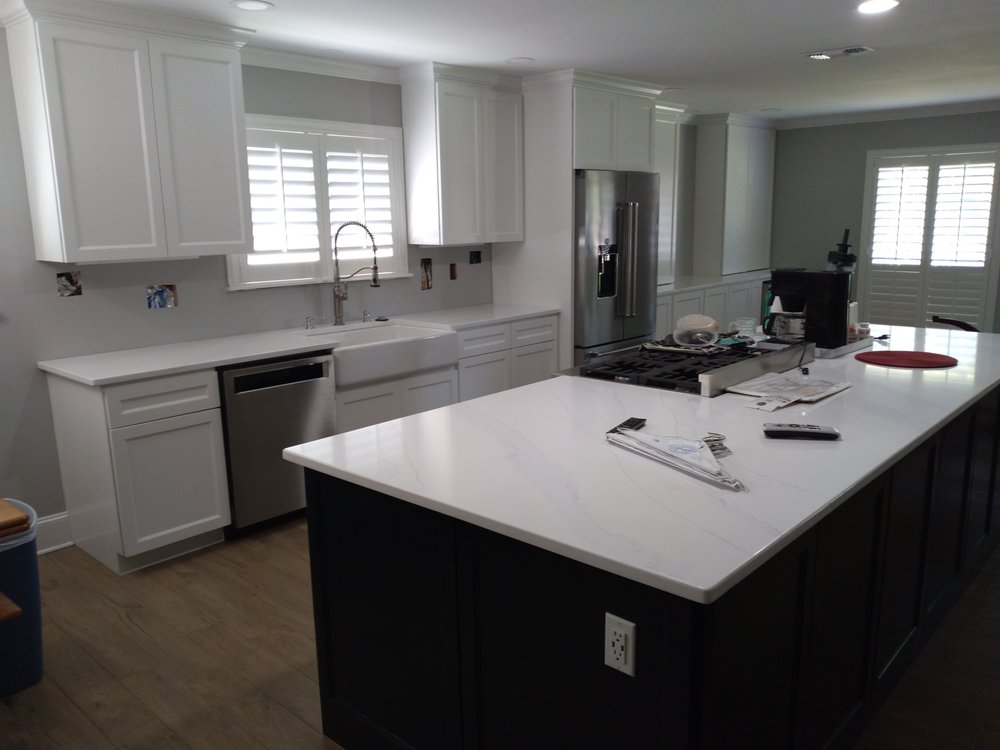 Slide of New Millennium House Remodeling