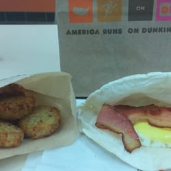 Dunkin' - Wake-up wrap w/bacon. Side of hashbrowns.