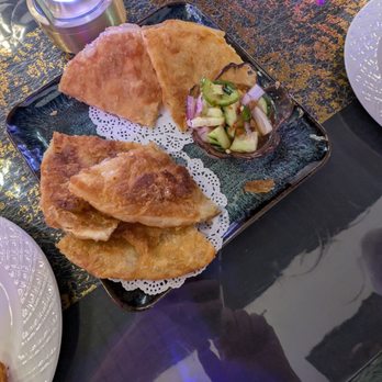 Chalawan Thai Cuisiine - Roti (we couldn't wait to take pictures, the first 2 slices are missing from the picture) - Thai Near Me - New Braunfels, Texas