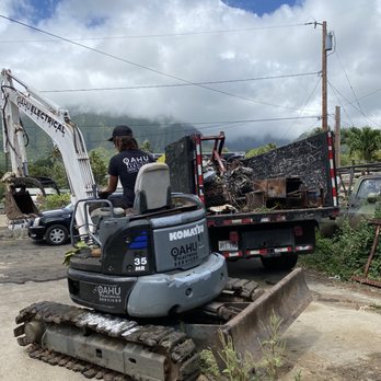 Aloha Junk Man - Excavator that put motor into truck. - Junk Removal & Hauling Near Me - Kailua, Hawaii Aloha Junk Man - Excavator that put motor into truck. - Junk Removal & Hauling Near Me - Kailua, Hawaii