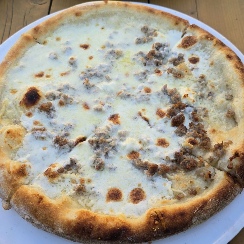 Zarletti Mequon - Bianca pizza with mild Italian sausage added to it - Italian Near Me - Mequon, Wisconsin Zarletti Mequon - Bianca pizza with mild Italian sausage added to it - Italian Near Me - Mequon, Wisconsin