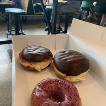 DOZER Coffee - Boston cream pie and blueberry dip donuts - Cafes Near Me - Ann Arbor, Michigan