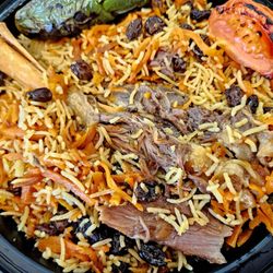 Baba Grill - Lamb shank is slow cooked, soft, tender, fall-off-the-bone meat (with right amount of collagen & fat) & solid flavor, with qabeli rice.