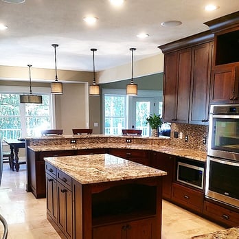 Butler Building Co. - a kitchen with granite countertops - General Contractors Near Me - Howard City, Michigan Butler Building Co. - a kitchen with granite countertops - General Contractors Near Me - Howard City, Michigan