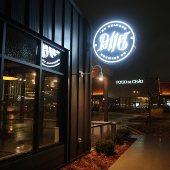 Alter Brewing + Kitchen - Evening signage view with neighbor Fogo de Chao in background. - Brewpubs Near Me - Oak Brook, Illinois