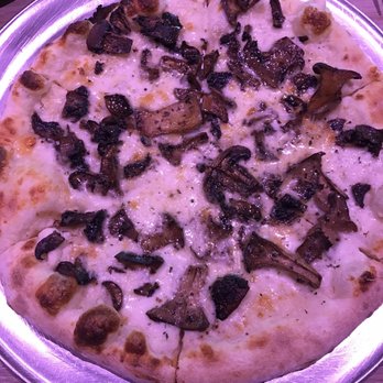 Moku Kitchen - Mushroom pizza was good, but in the middle of the pizza the crust was soft and saggy - Cocktail Bars Near Me - Honolulu, Hawaii