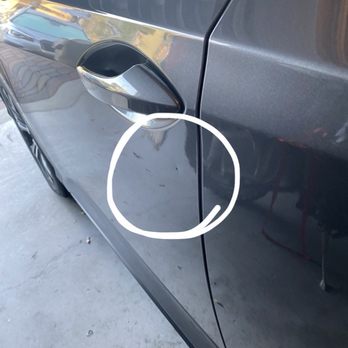 Orange County Paintless Dent Company - A different angle of the dent on my vehicle - Mobile Dent Repair Near Me - Winter Park, Florida