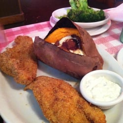 Logan's Roadhouse - Catfish w/baked sweet potato & steamed broccoli.