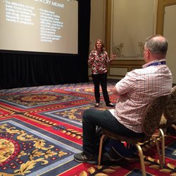 Lora L Tanis, DC - Tanis Family Chiropractic - The expert giving a seminar to other practitioners.