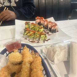 Tempura Shrimp & Veggie Tempura and sushi rolls