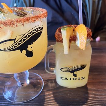 Catrin Cantina - Margaritas (left large Texas, right regular tropical). They give you the option of a tajin rim or a tajim chamoy rim. - Seafood Near Me - Newport News, Virginia