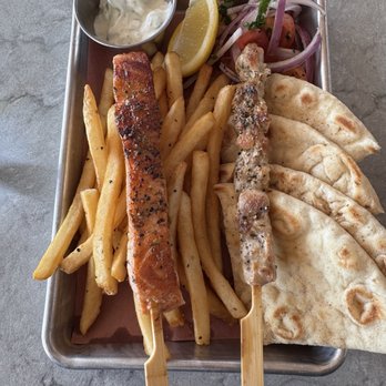 Echoes Cafe - Salmon and chicken souvlaki with fries, pita and tzatziki sauce - Greek Near Me - Houston, Texas