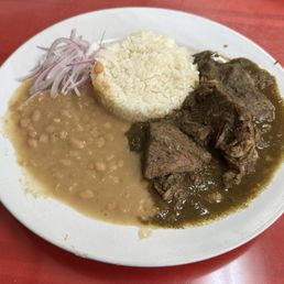 Seco de Res Combinado (slow roasted beef stew with rice and beans)
