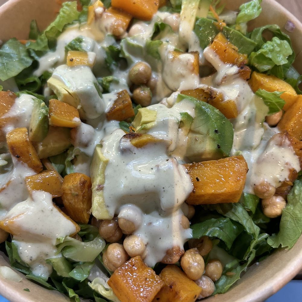 Salad with avocado, roasted chickpeas, roasted sweet potatoes, avocado-based dressing. Salad with avocado, roasted chickpeas, roasted sweet potatoes, avocado-based dressing.