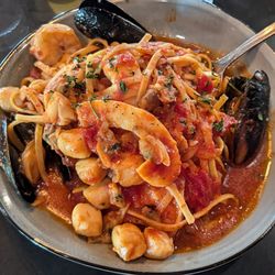 NICO & VALI Italian Eatery - Seafood linguini with shrimp, mussels, clams, scallops, and calamari in a flavorful marinara sauce.