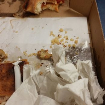 Angela's Pizzeria - Some of the garlic remnants...there are plenty more under the napkins, along with the remainder of the slice I couldn't eat. - Pizza Near Me - Islip, New York Angela's Pizzeria - Some of the garlic remnants...there are plenty more under the napkins, along with the remainder of the slice I couldn't eat. - Pizza Near Me - Islip, New York