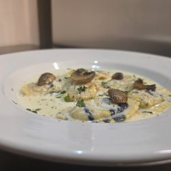 Café Massé Ristoranté Italiano - White Truffle Wild Mushroom Ravioli in a mushroom cream sauce