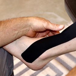 Moore Chiropractic - Extremity adjustments & kinesiology taping (KT)