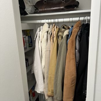 Organizing with Erin - After photo of hall way closet - Home Organization Near Me