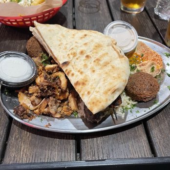 Laziza Mediterranean Grill - Evans  - Pita on top of mixed grill - Middle Eastern Near Me - Evans, Georgia