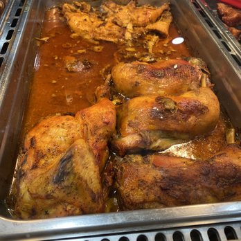Las Palmas Cafe - a tray of chicken in a sauce - Latin American Near Me - Delran, New Jersey Las Palmas Cafe - a tray of chicken in a sauce - Latin American Near Me - Delran, New Jersey