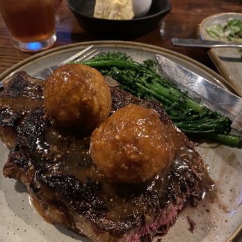 Sundae Cafe - 22oz bone in ribeye cooked medium rare, crawfish tater tots, broccolini. - Seafood Near Me - Tybee Island, Georgia Sundae Cafe - 22oz bone in ribeye cooked medium rare, crawfish tater tots, broccolini. - Seafood Near Me - Tybee Island, Georgia