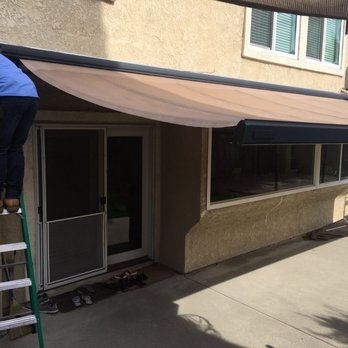 Excellence Awning Service - Checking the awnings to see how to get started. - Awnings Near Me - Fullerton, California