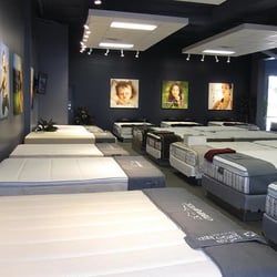 Olinde's Mattress Superstore - Interior of store - 43 mattresses to choose from