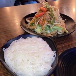Lao style papaya salad with a side of noodles