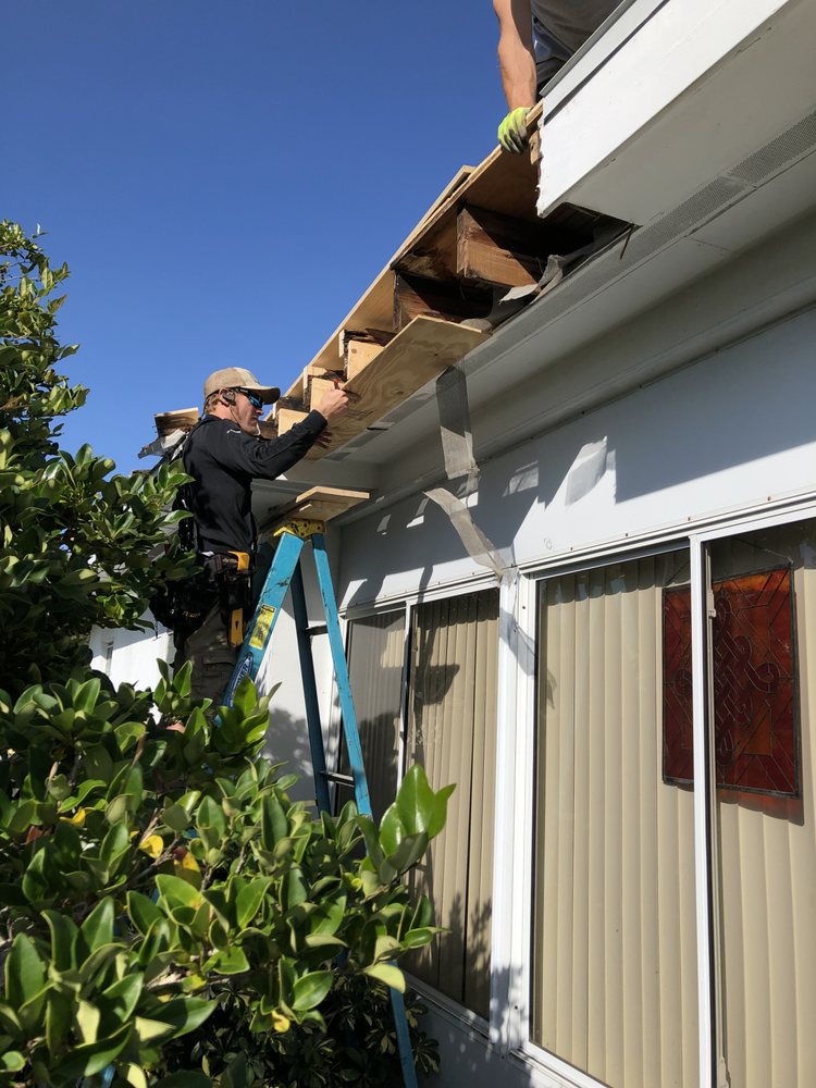 Slide of Dutchs Roofing Company