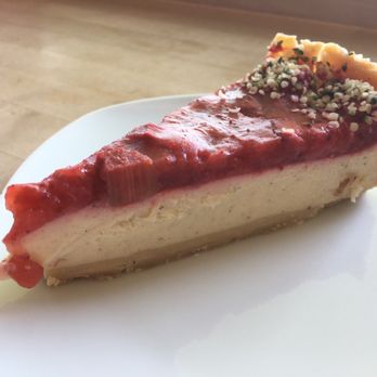 Goodies - Raw vanilla cashew cheezecake with spelt flour crust and strawberry rhubarb topping. Om nom nom - Cafes Near Me - Berlin, BE