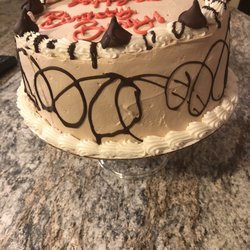 Dunkin' - This is the cake we received not pink but beige, no sprinkles and haphazardly decorated.