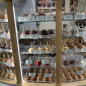 Rocky Mountain Chocolate Factory - All the apples. They have the price and ingredients for each. - Chocolatiers & Shops Near Me - Montclair, California